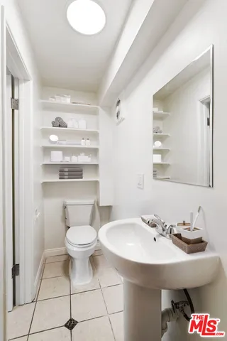 a bathroom with a sink and a toilet