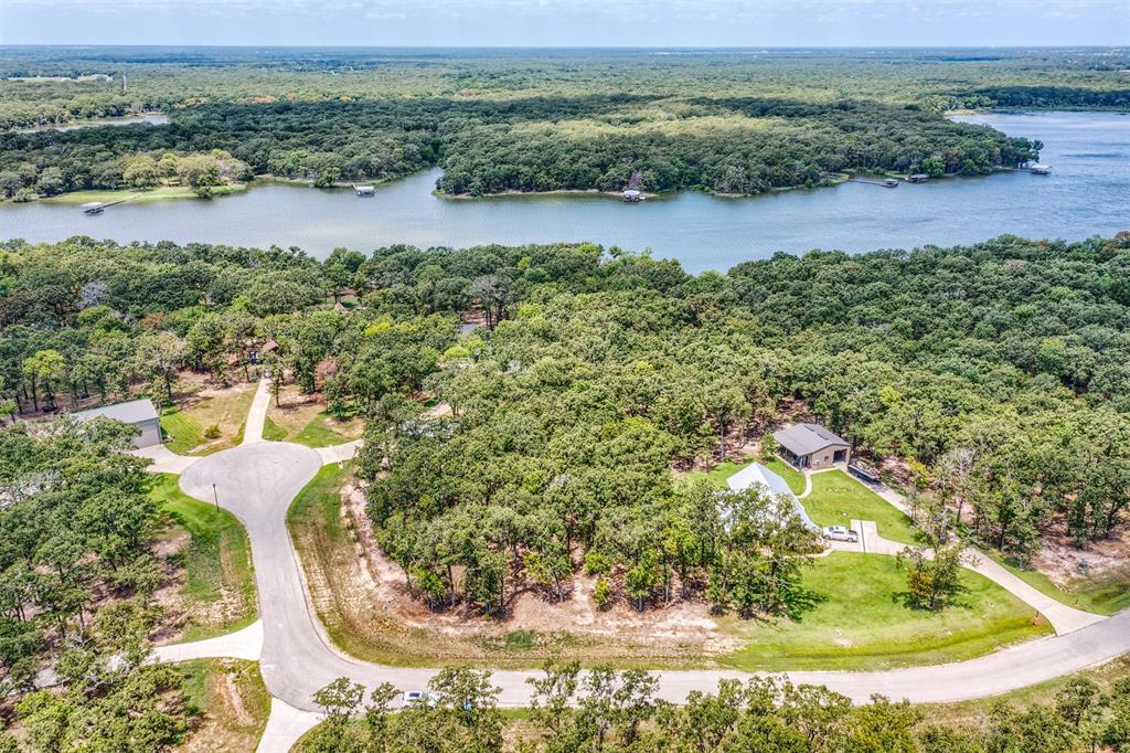Lot 68 Anchor Point Quinlan, TX 75474 - Photo 3 of 15 an aerial view of a house with outdoor space and lake view