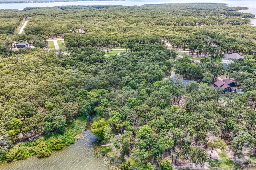 Lot 68 Anchor Point Quinlan, TX 75474 - Photo 8 of 15 an aerial view of residential houses with outdoor space and trees