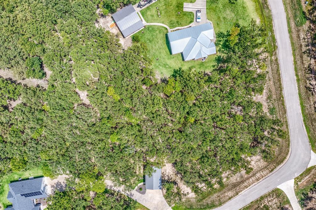 Lot 68 Anchor Point Quinlan, TX 75474 - Photo 9 of 15 an aerial view of a house with a yard and garden