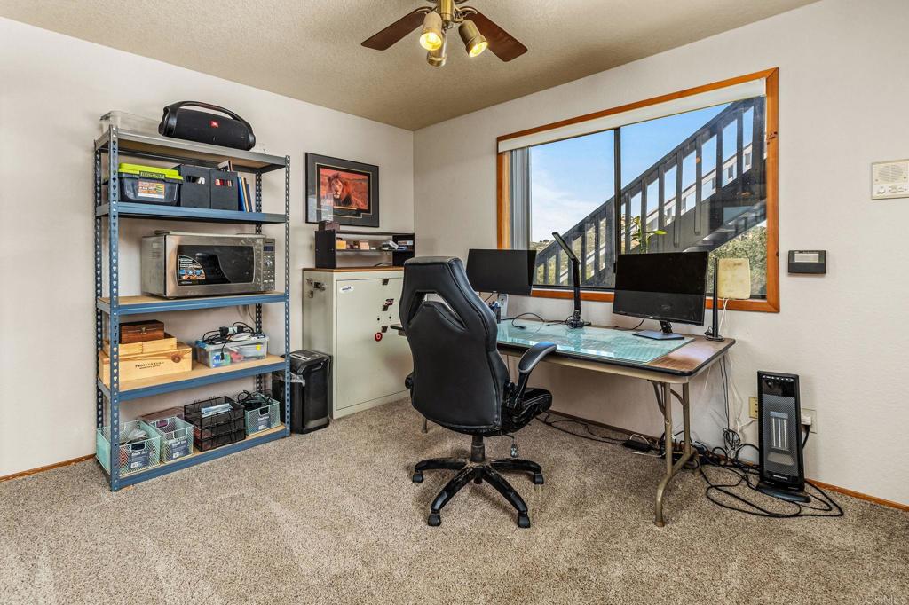 17901 Lyons Valley Road Jamul, CA 91935 - Photo 41 of 52 a view of a workspace with furniture
