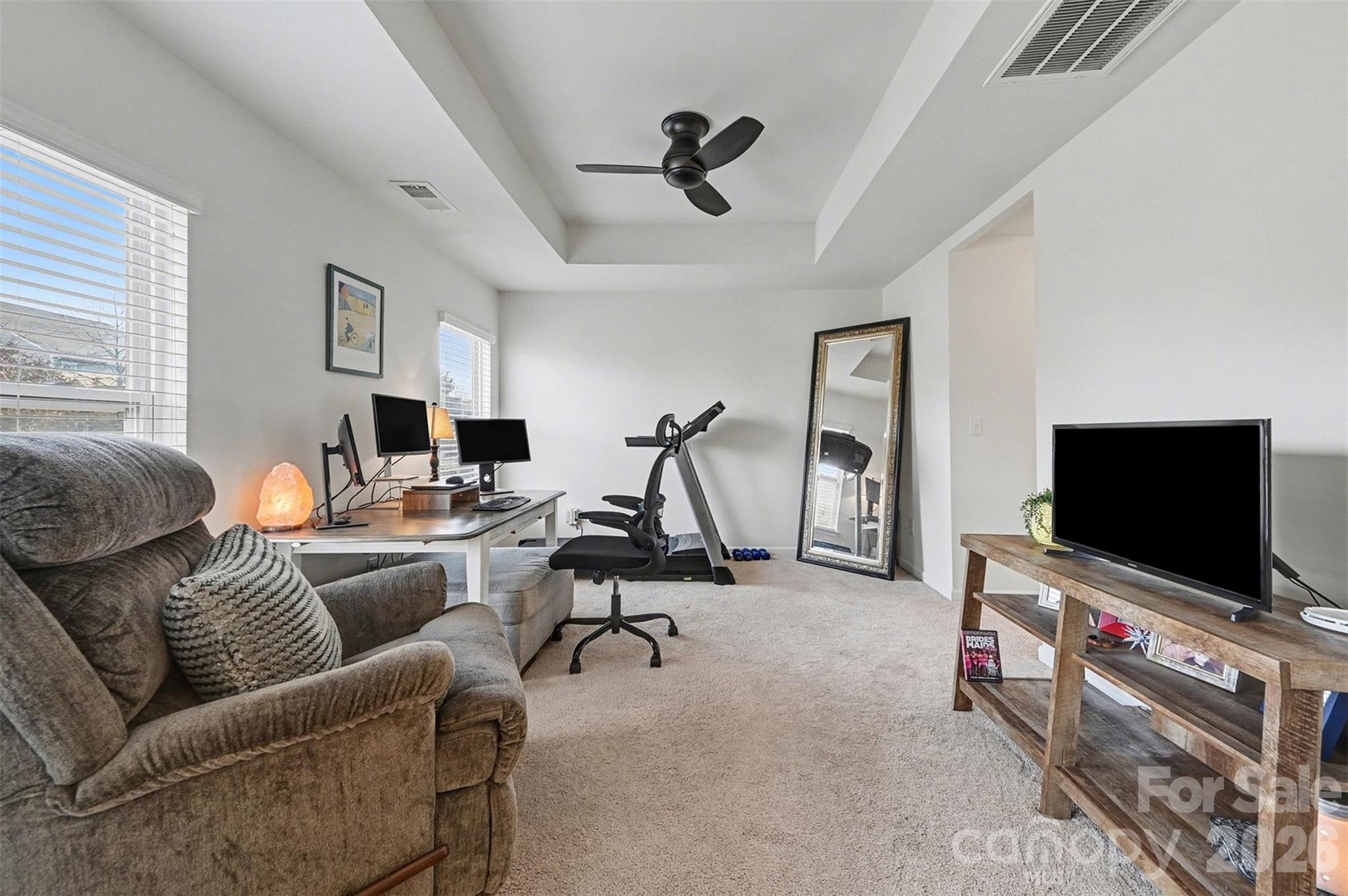 3009 Canopy Drive Indian Trail, NC 28079 - Photo 19 of 35 a living room with furniture and a flat screen tv