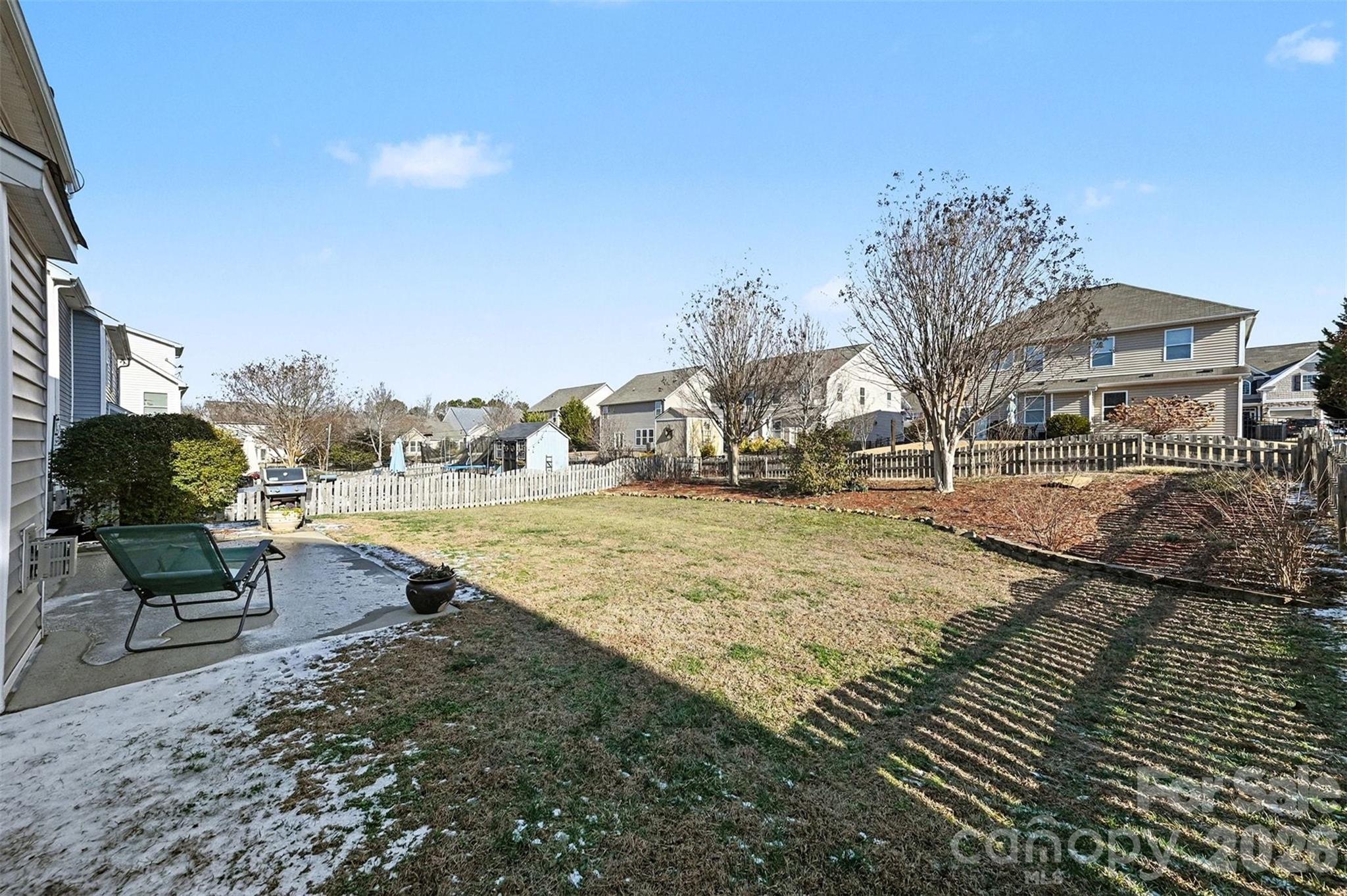 3009 Canopy Drive Indian Trail, NC 28079 - Photo 28 of 35 a view of a patio with a yard