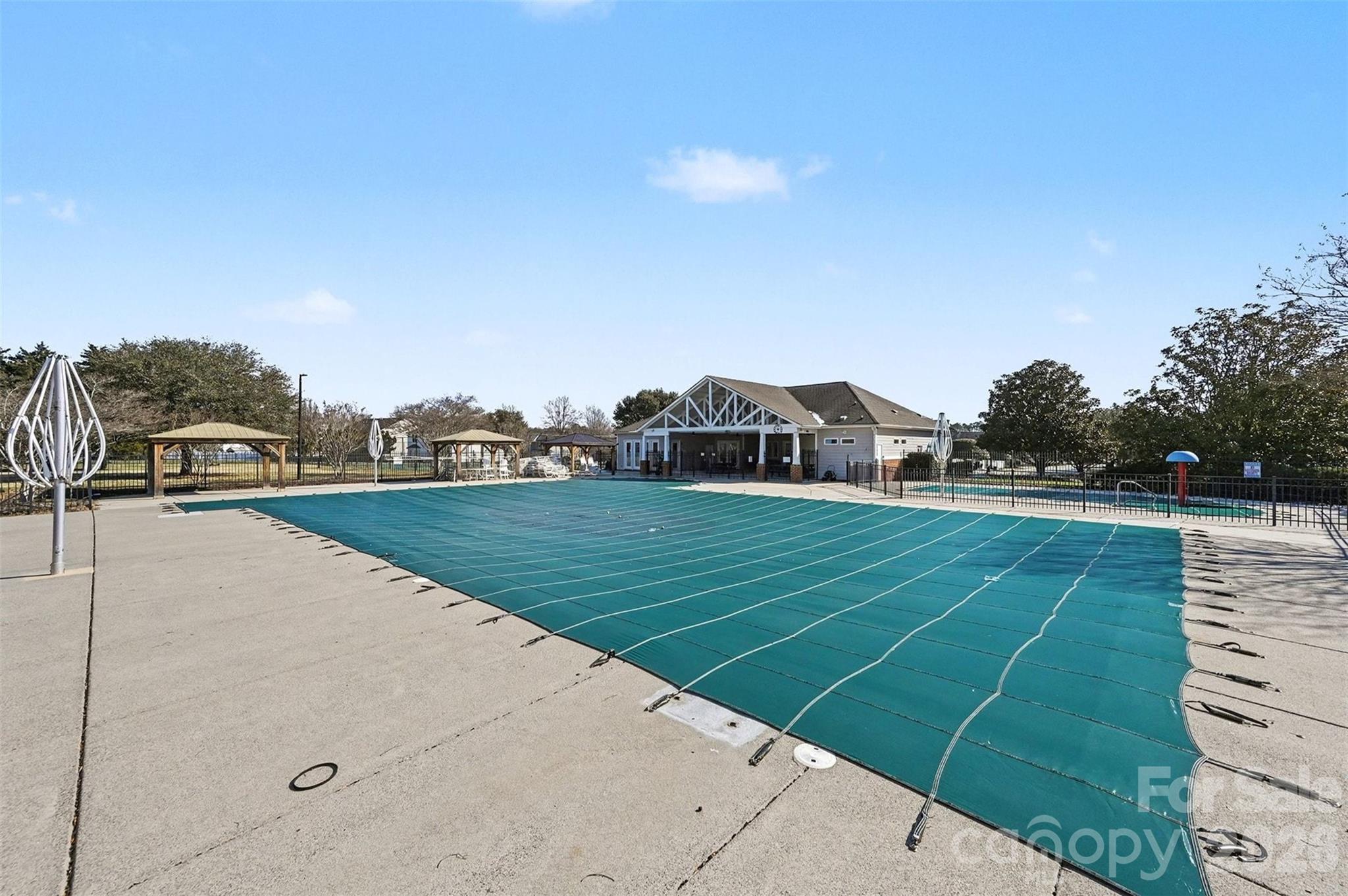 3009 Canopy Drive Indian Trail, NC 28079 - Photo 34 of 35 a view of a tennis ground with large trees