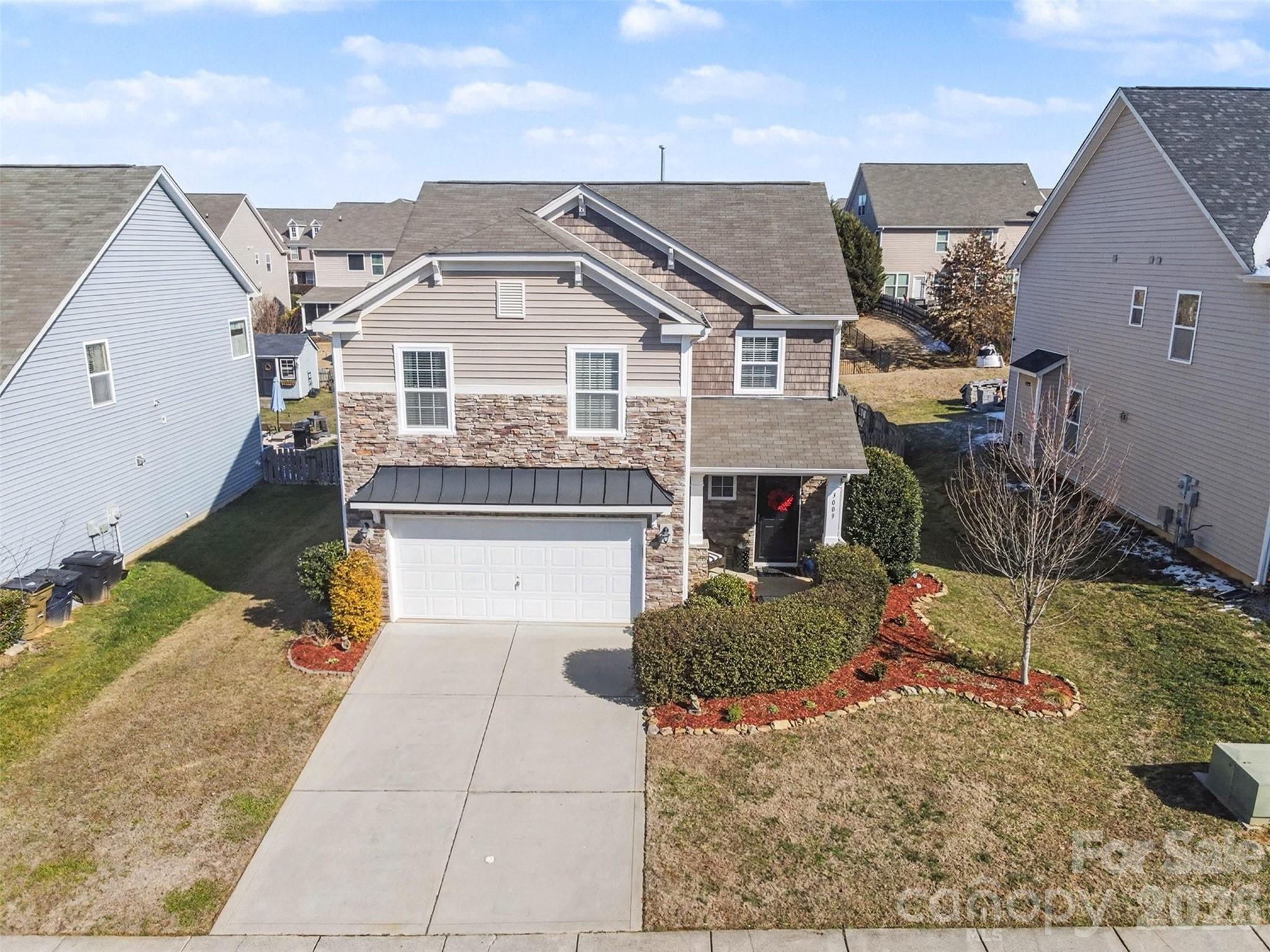 3009 Canopy Drive Indian Trail, NC 28079 - Photo 35 of 35 an aerial view of a house with a yard