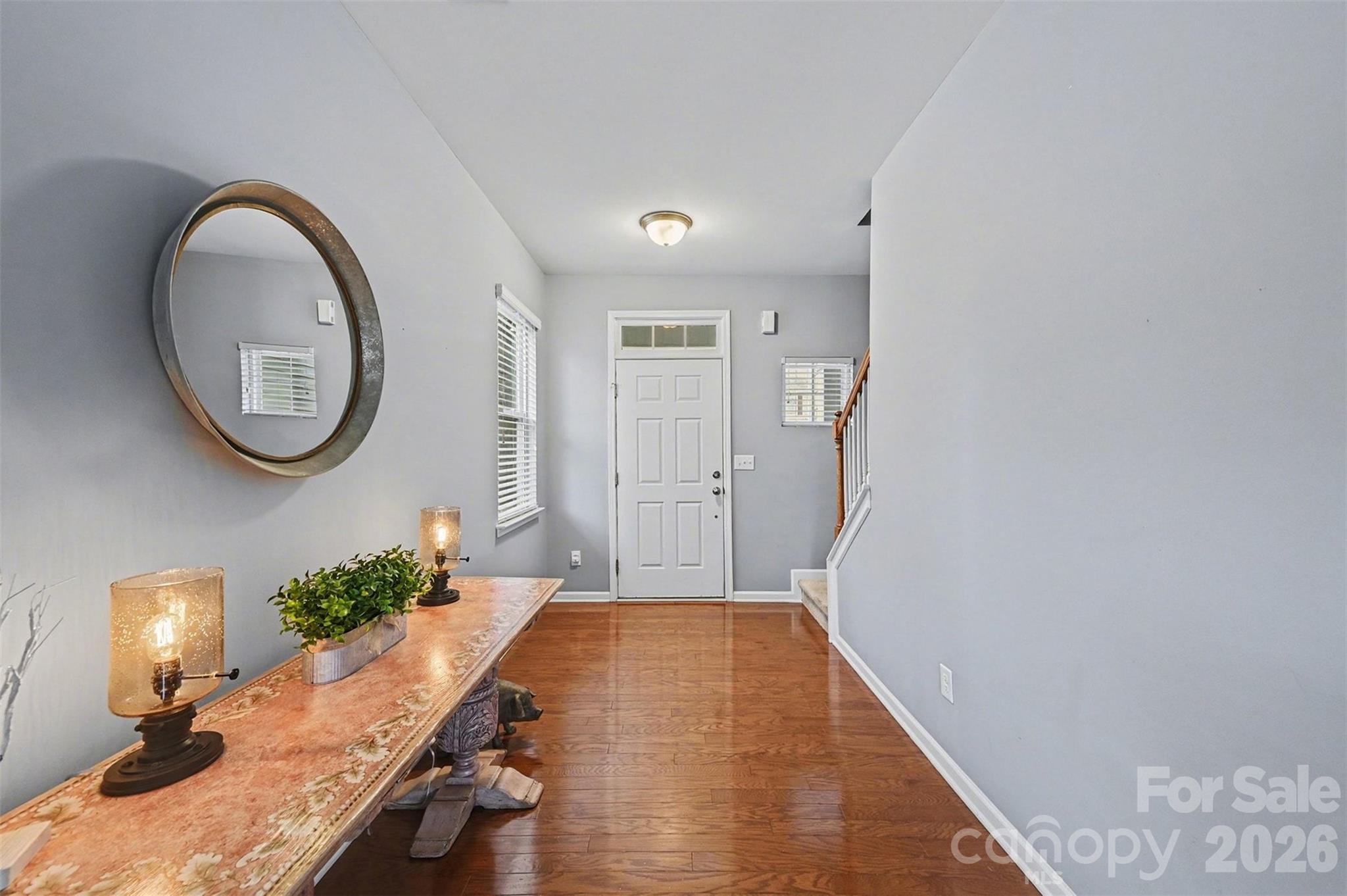 3009 Canopy Drive Indian Trail, NC 28079 - Photo 7 of 35 a bathroom with a granite countertop sink a mirror and a potted plant