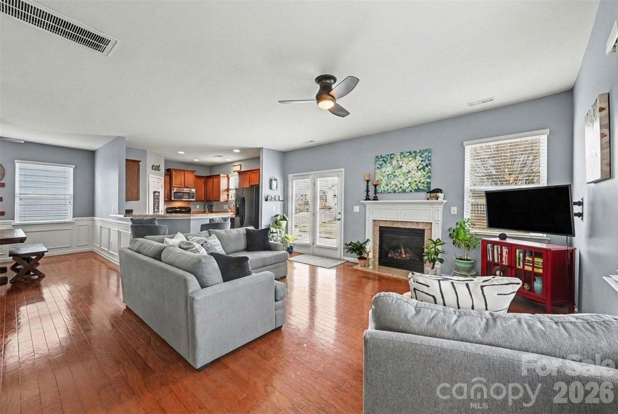 3009 Canopy Drive Indian Trail, NC 28079 - Photo 8 of 35 a living room with fireplace furniture and a flat screen tv