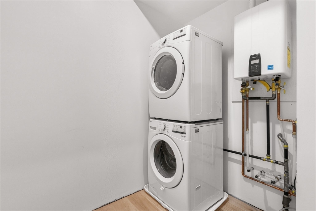 47 Condor Street, Unit 203A Boston, MA 02128 - Photo 12 of 15 a utility room with dryer and washer