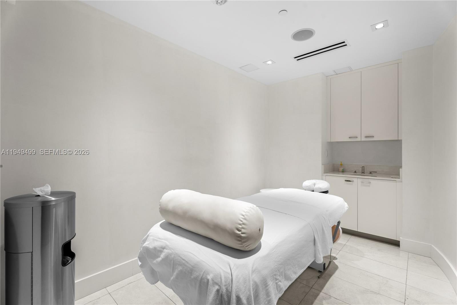 1643 Brickell Avenue, Unit 2506 Miami, FL 33129 - Photo 59 of 85 a bedroom with a bed and a couch