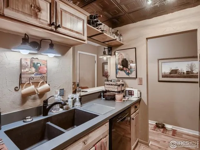 a kitchen with a sink cabinets and a sink
