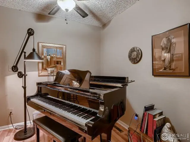 a view of a workspace with furniture
