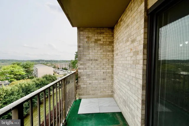 a view of a balcony with an outdoor space