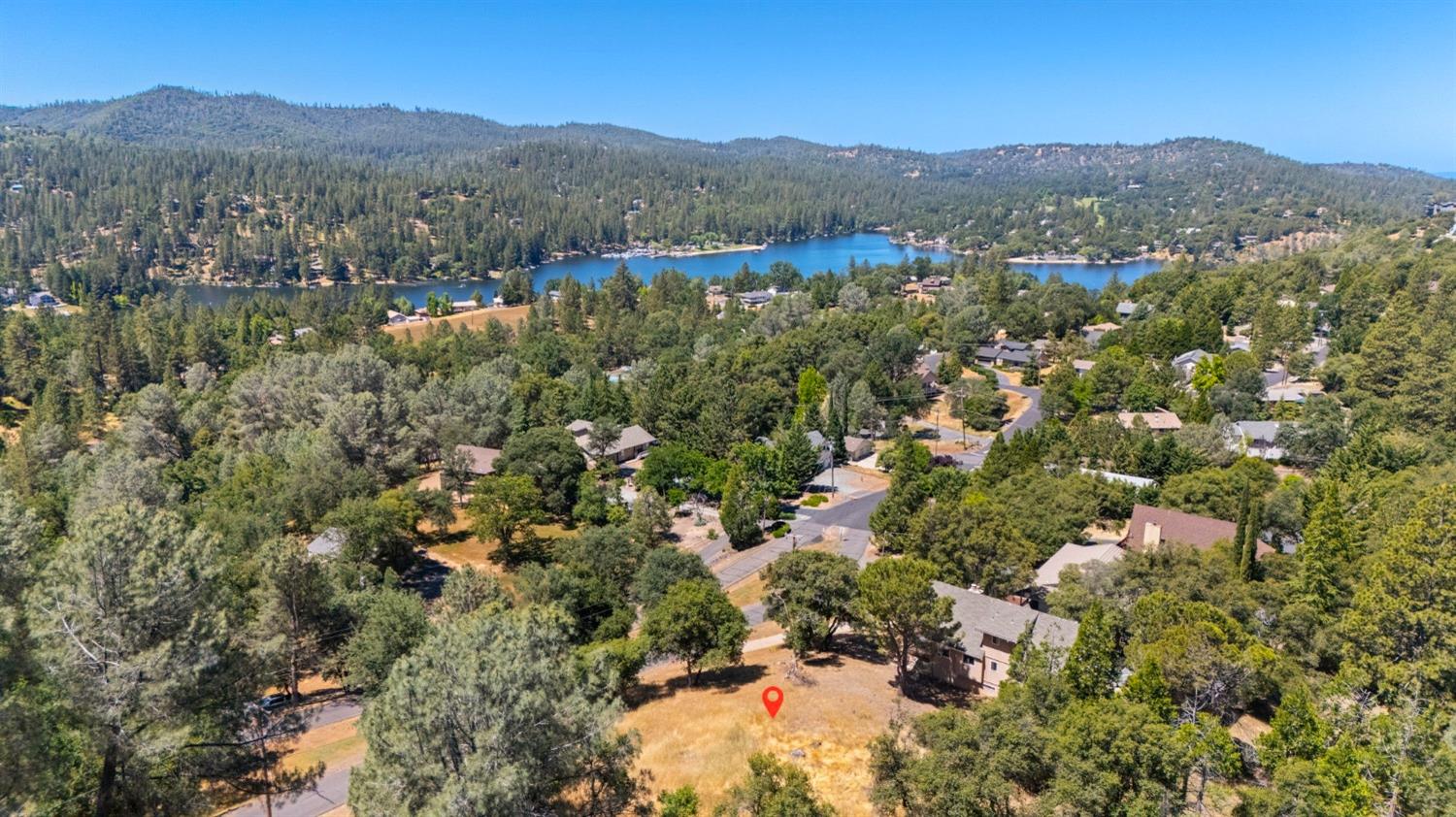 308 Longview Street Groveland, CA 95321 - Photo 1 of 16 a view of a town with trees in the background