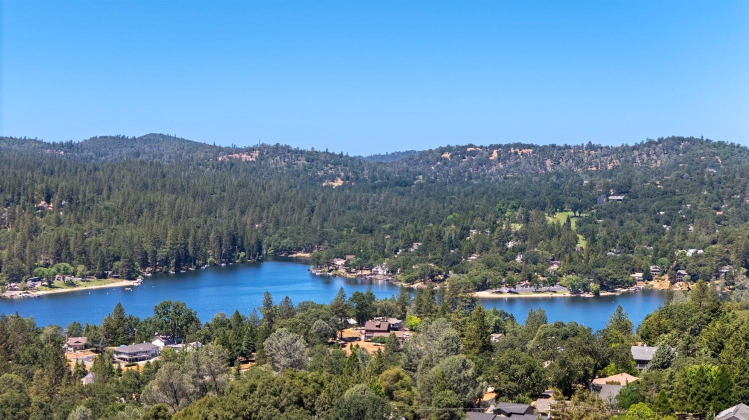 308 Longview Street Groveland, CA 95321 - Photo 11 of 16 a view of a lake with a mountain in the background