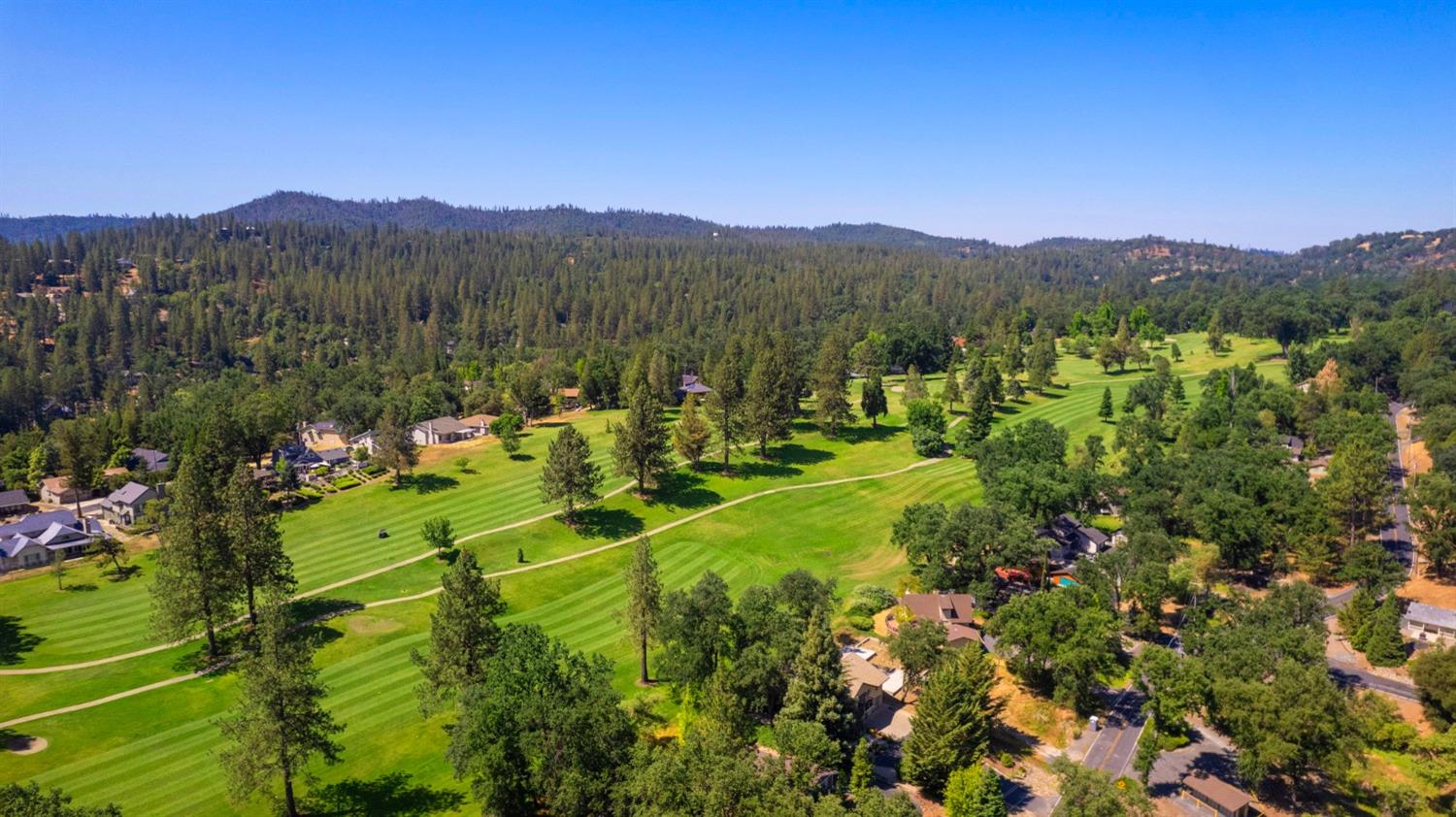 308 Longview Street Groveland, CA 95321 - Photo 13 of 16 a view of a lush green hillside and houses