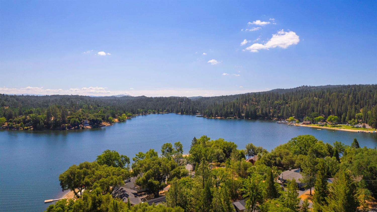 308 Longview Street Groveland, CA 95321 - Photo 15 of 16 a view of a lake with houses in the back