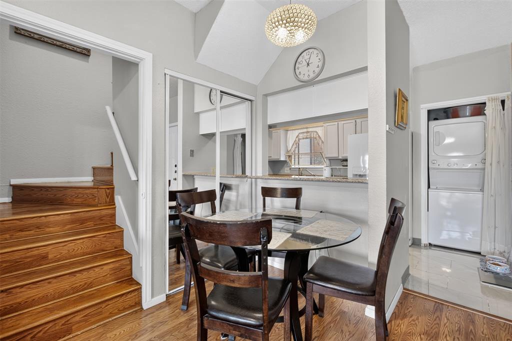 5550 Spring Valley Road, Unit G24 Dallas, TX 75254 - Photo 13 of 23 a view of a dining room with furniture and wooden floor