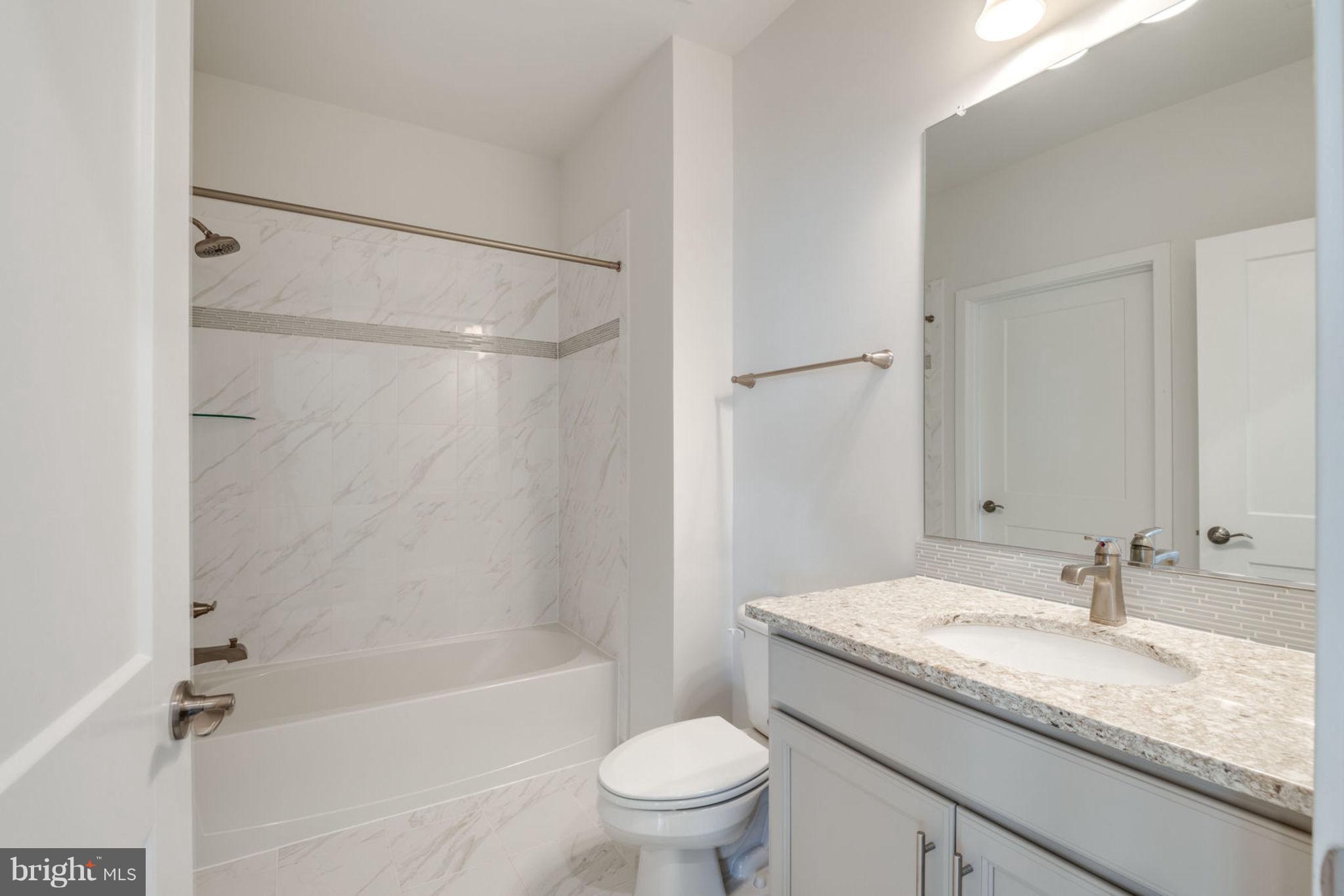 1951 Reston Valley Way, Unit 9 Reston, VA 20191 - Photo 9 of 9 GUEST BATHROOM