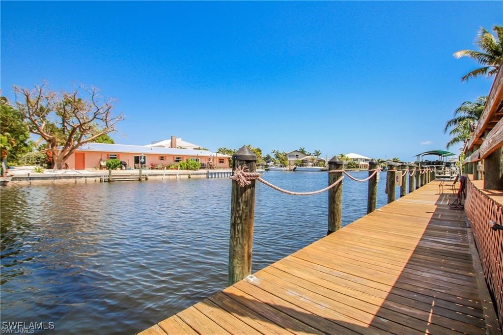 3226 Stringfellow Road St. James City, FL 33956 - Photo 17 of 28 a view of outdoor space and ocean view