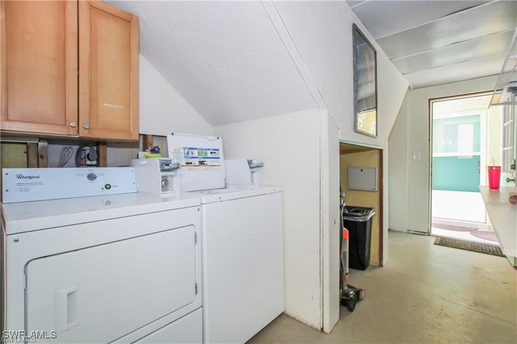3226 Stringfellow Road St. James City, FL 33956 - Photo 27 of 28 a utility room with dryer and washer