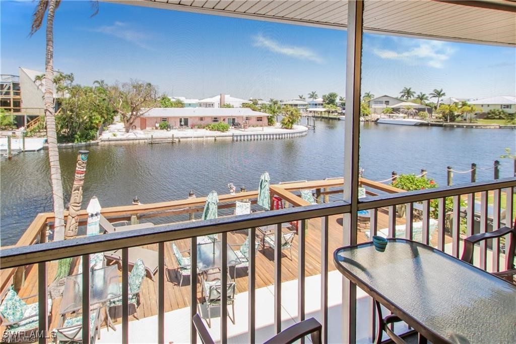 3226 Stringfellow Road St. James City, FL 33956 - Photo 28 of 28 a view of a balcony with an ocean view