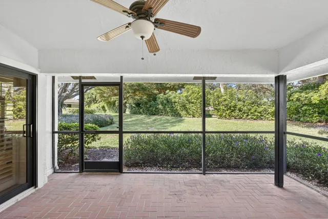 an empty room with windows and view