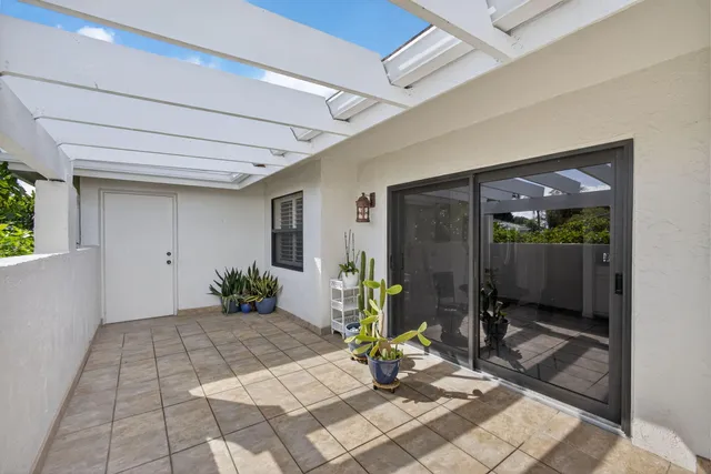 a view of a porch with seating space