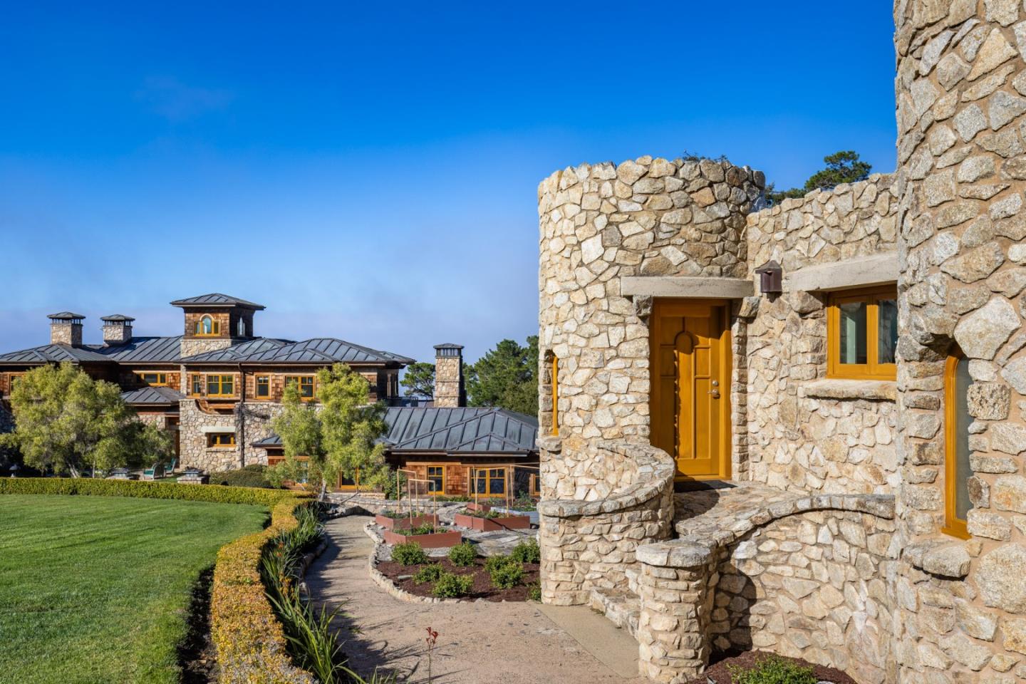 72 Fern Canyon Road Carmel, CA 93923 - Photo 57 of 66 a front view of a house with garden