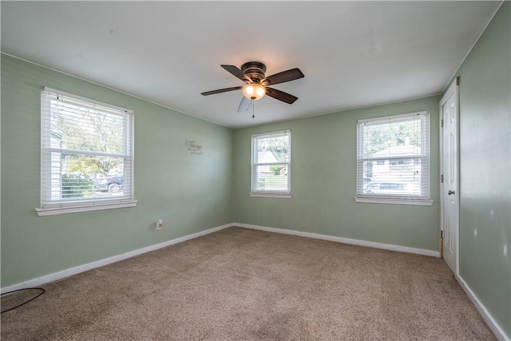 2138 Swallow Hill Road Pittsburgh, PA 15220 - Photo 14 of 29 a view of room with a ceiling fan and a window