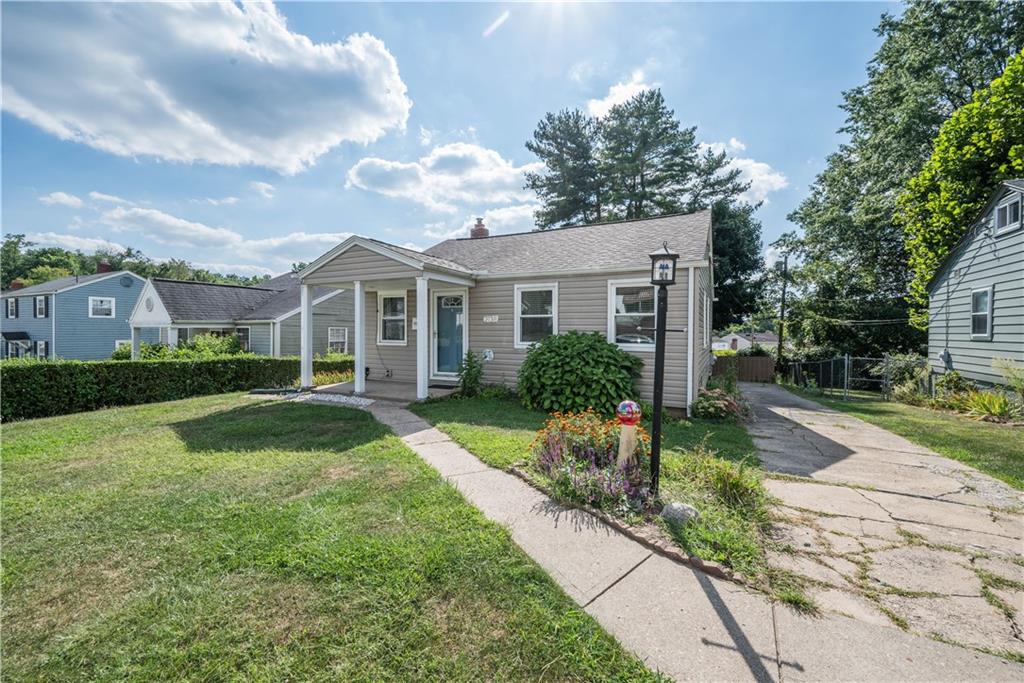 2138 Swallow Hill Road Pittsburgh, PA 15220 - Photo 3 of 29 a front view of a house with a yard