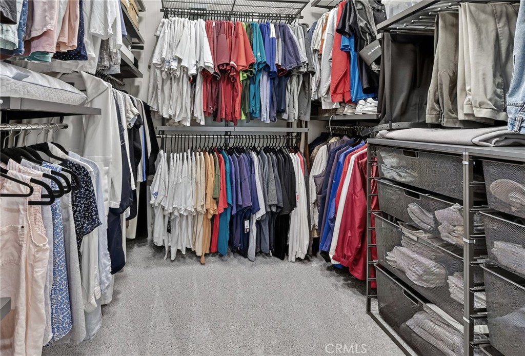 3446 Doheny Way Dana Point, CA 92629 - Photo 31 of 58 a view of walk in closet with clothes