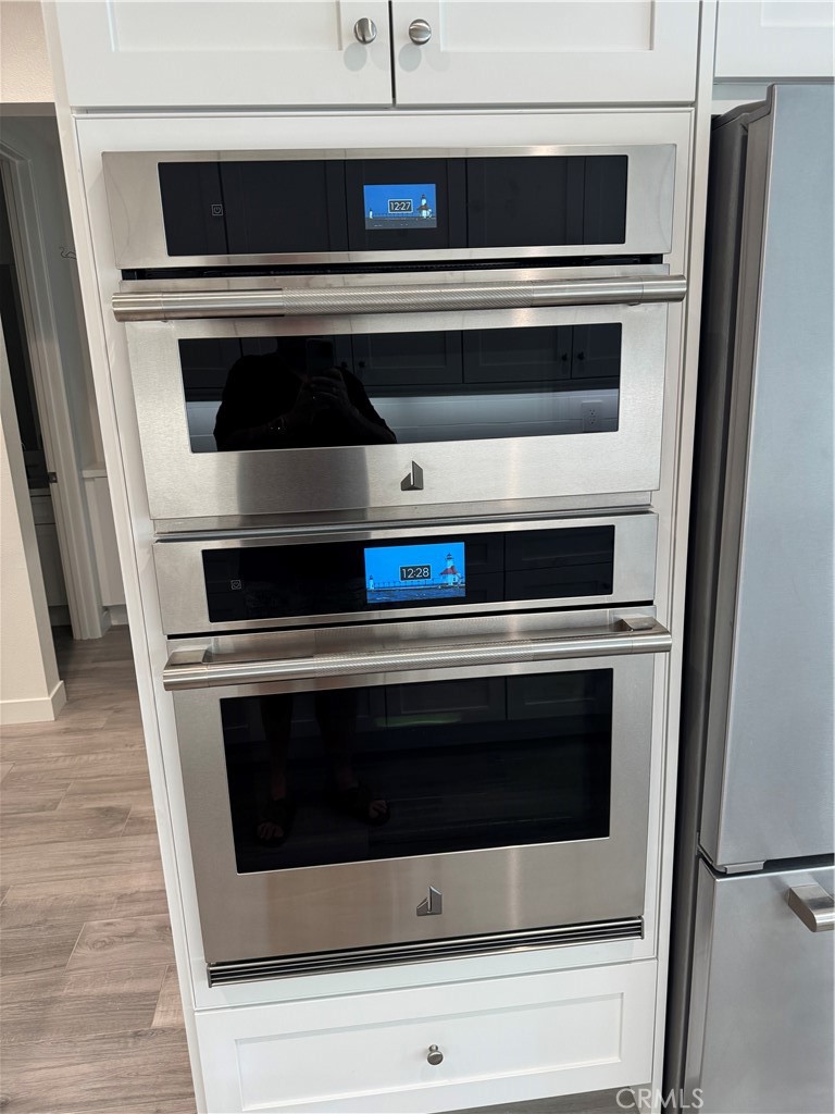 3446 Doheny Way Dana Point, CA 92629 - Photo 50 of 58 a stove top oven sitting inside of a kitchen