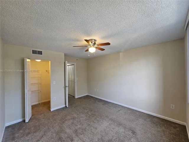 wooden floor in an empty room and a window