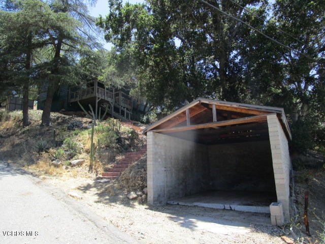 1019 Alta Vista Road Simi Valley, CA 93063 - Photo 22 of 22 a front view of a house with trees
