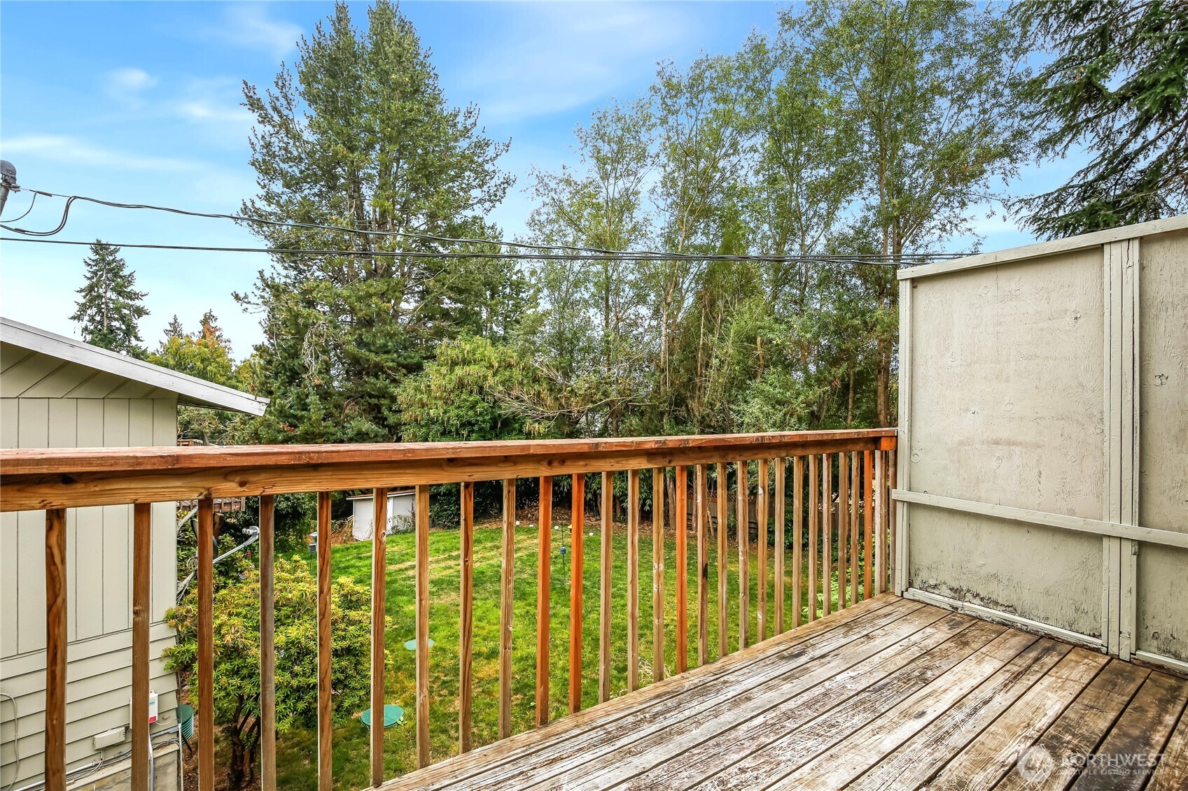 1901 Northeast 30th Street Bremerton, WA 98310 - Photo 15 of 31 a balcony with wooden floor and outdoor space