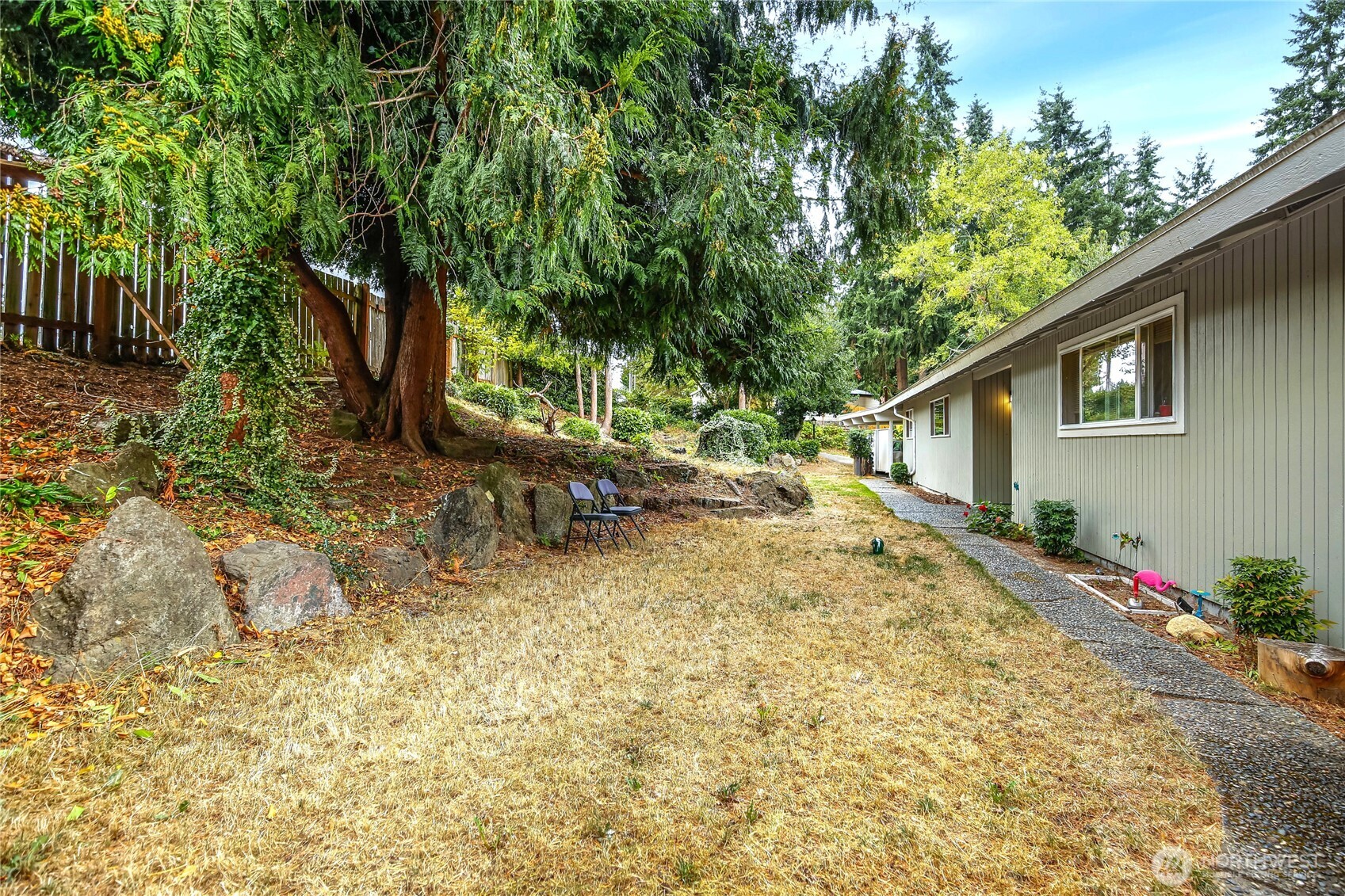 1901 Northeast 30th Street Bremerton, WA 98310 - Photo 16 of 31 a white house that has a tree in front of it