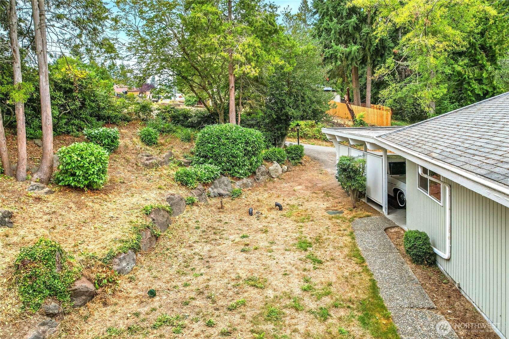 1901 Northeast 30th Street Bremerton, WA 98310 - Photo 19 of 31 a backyard of a house with lots of green space