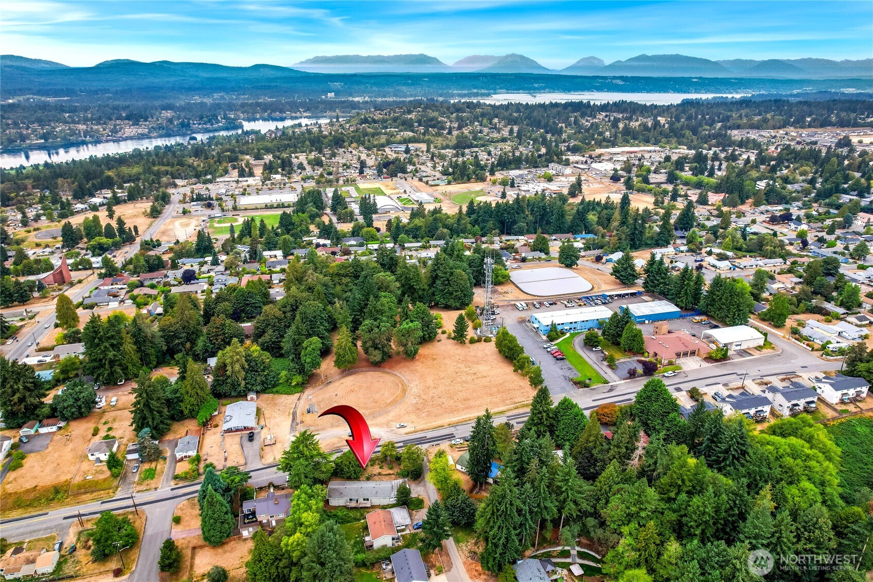 1901 Northeast 30th Street Bremerton, WA 98310 - Photo 22 of 31 an aerial view of residential houses with outdoor space