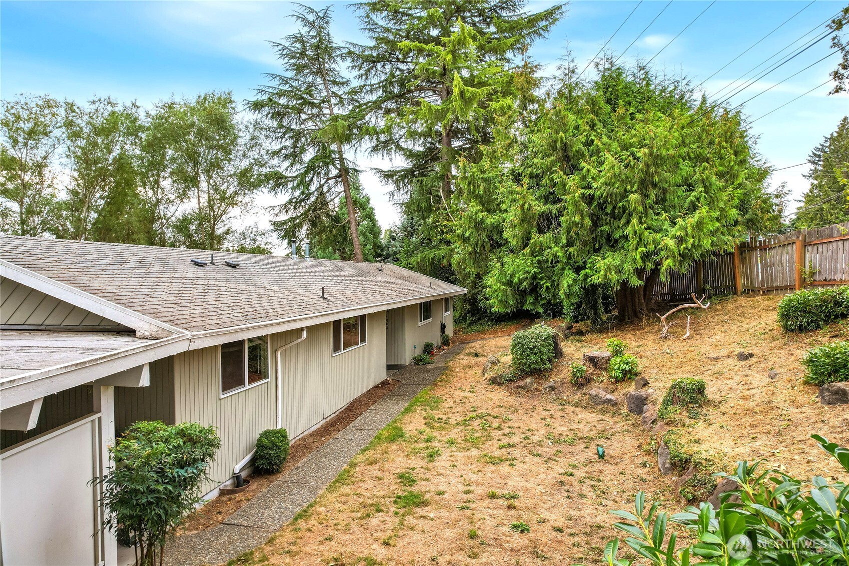 1901 Northeast 30th Street Bremerton, WA 98310 - Photo 3 of 31 a aerial view of a house with yard and sitting area