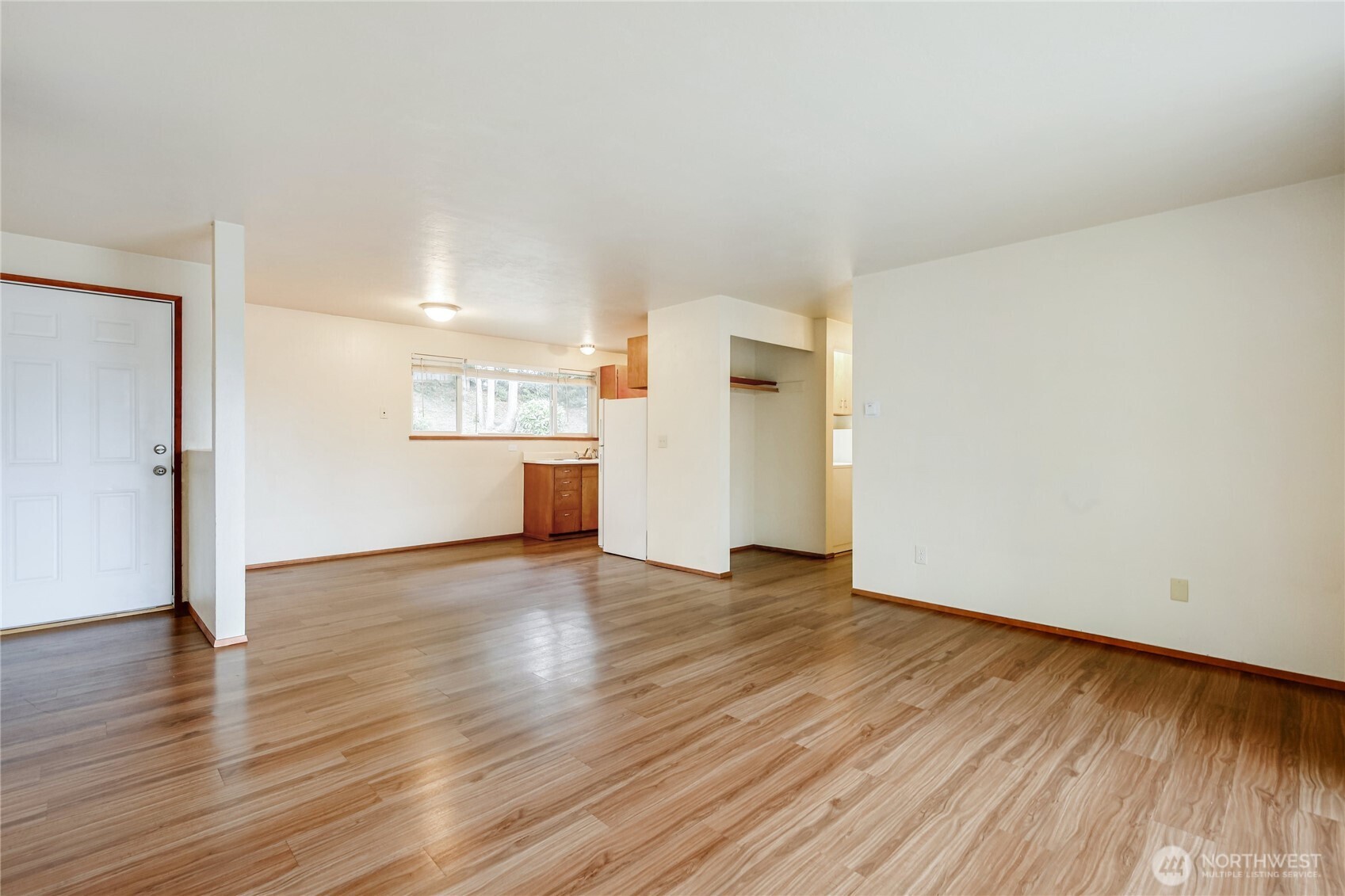 1901 Northeast 30th Street Bremerton, WA 98310 - Photo 5 of 31 a view of empty room with wooden floor