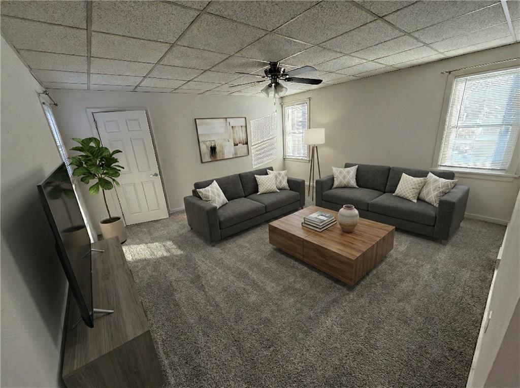 710 Locust Street, Unit 708 Bridgeville, PA 15017 - Photo 6 of 10 a living room with furniture and a window