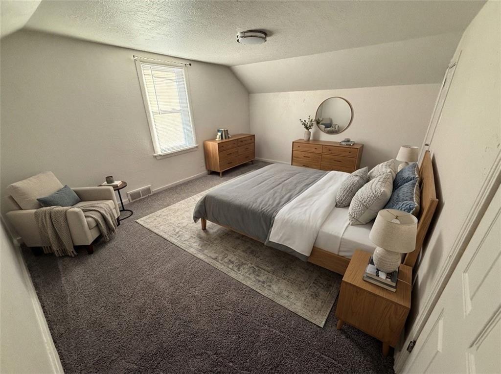 710 Locust Street, Unit 708 Bridgeville, PA 15017 - Photo 10 of 10 a bedroom with bed and a window