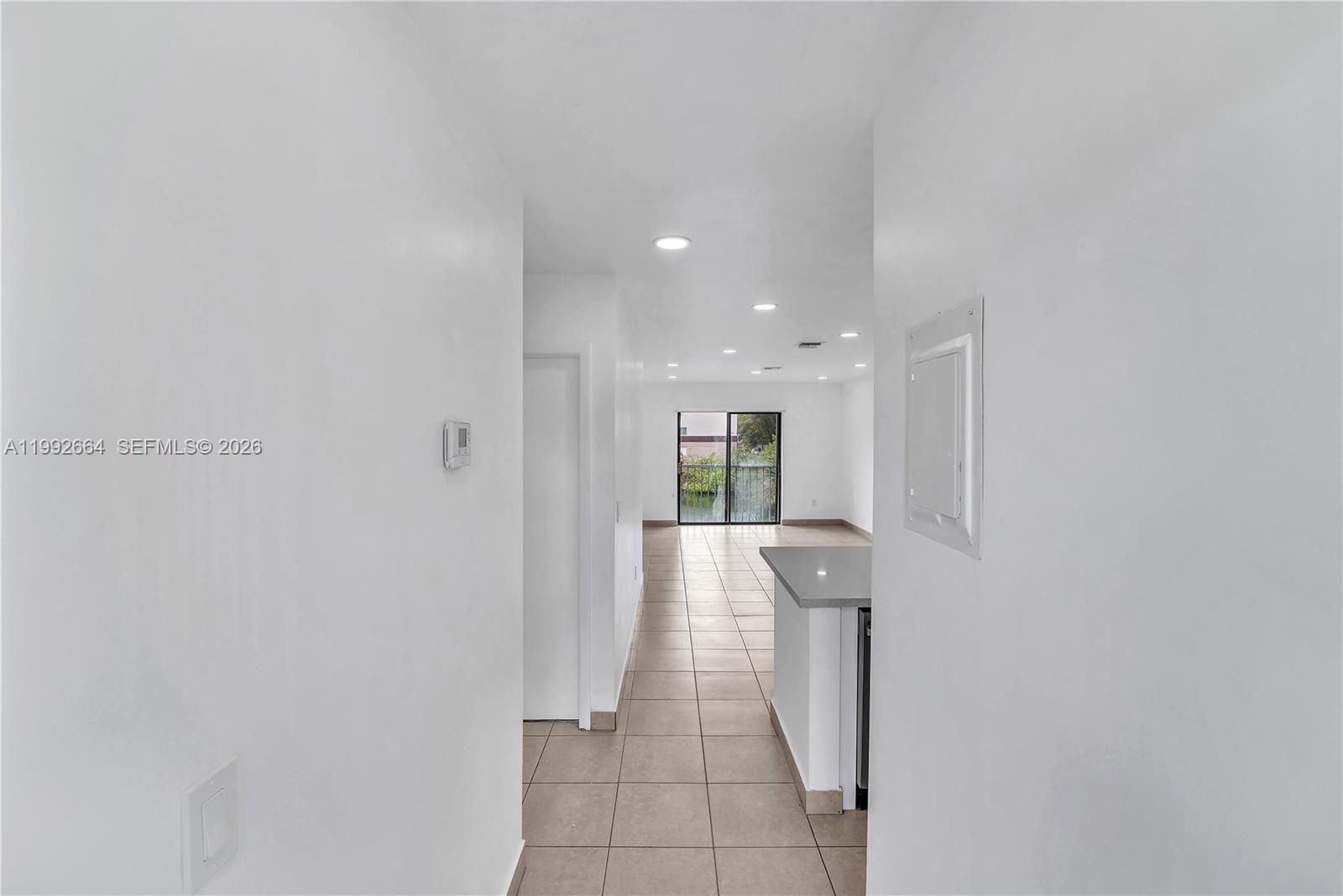 7668 Southwest 152nd Avenue, Unit 2211 Miami, FL 33193 - Photo 4 of 20 a bathroom with a sink and mirror