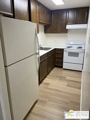 a view of a balcony with chairs