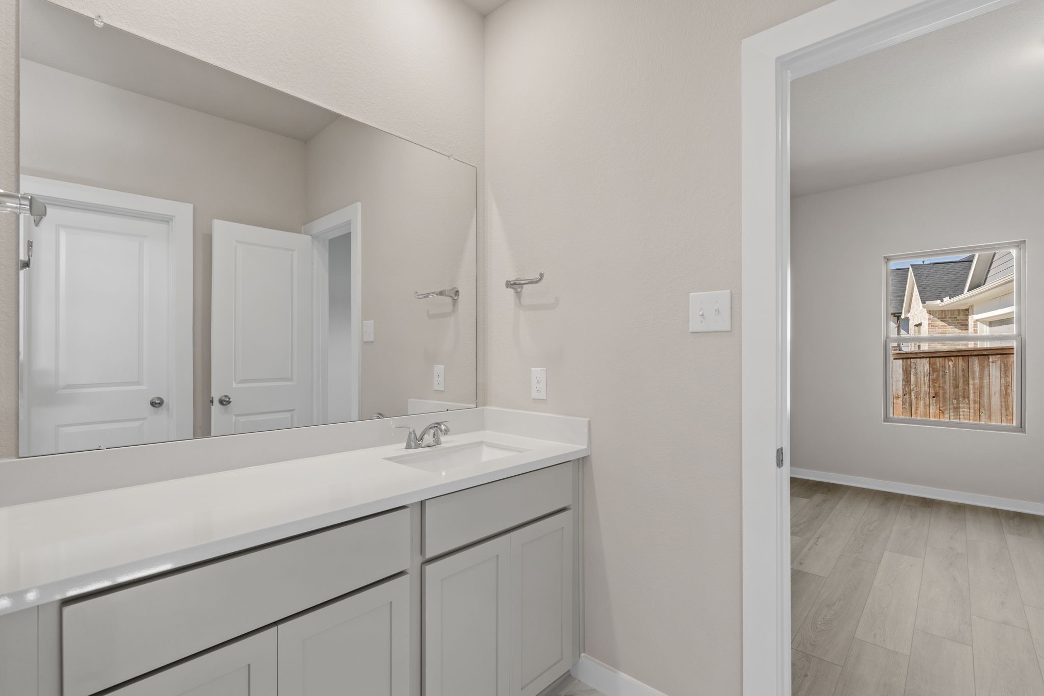 12015 Moonlight Path Drive Conroe, TX 77304 - Photo 19 of 31 a utility room with a sink dryer and washer