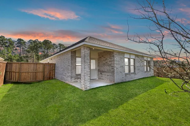 a view of a backyard with a garden