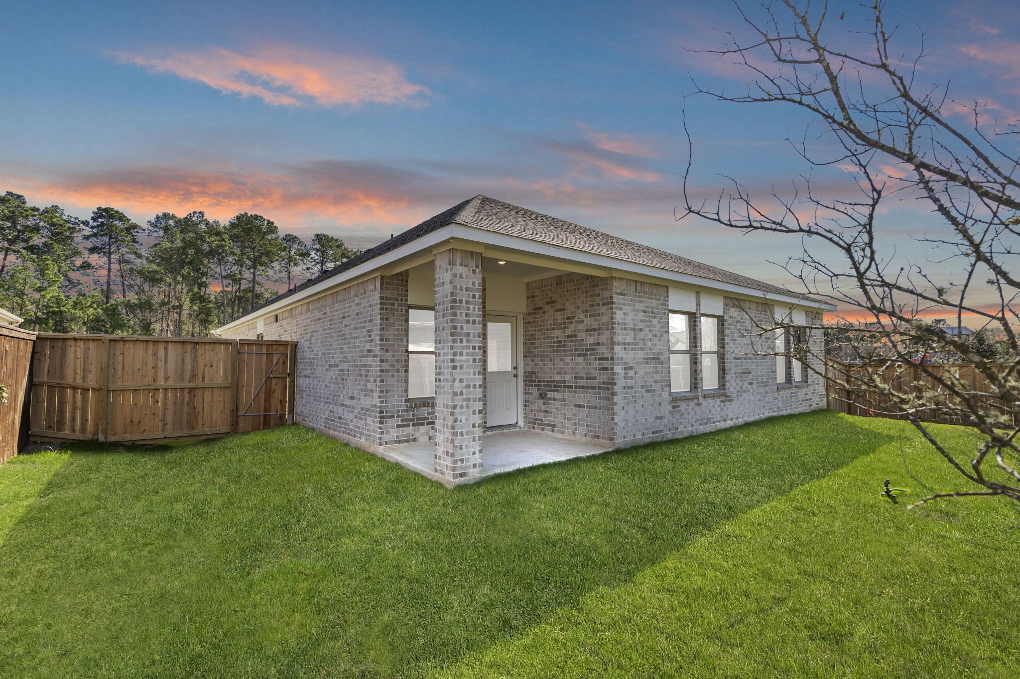12015 Moonlight Path Drive Conroe, TX 77304 - Photo 24 of 31 a view of a backyard with a garden