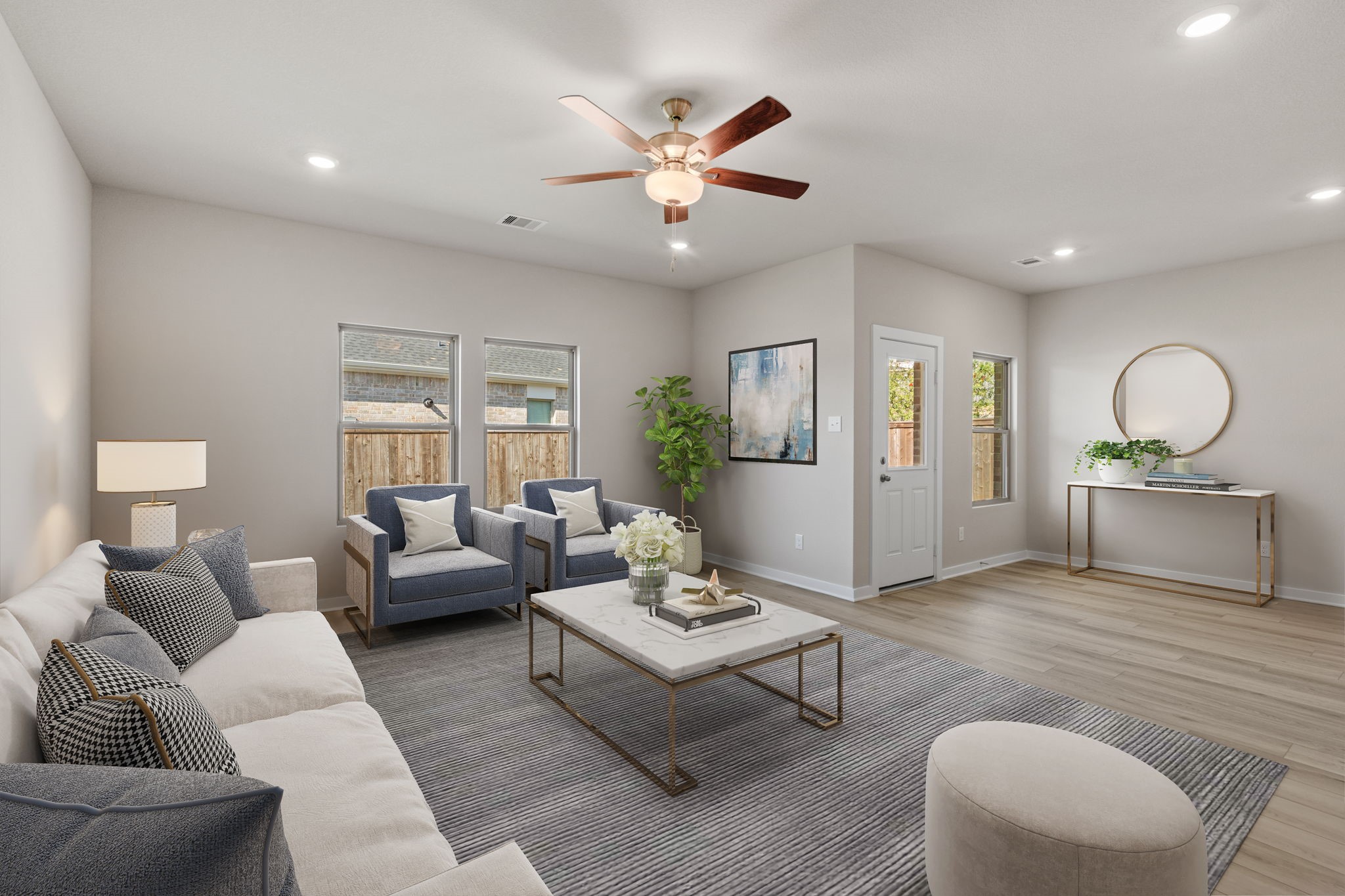 12015 Moonlight Path Drive Conroe, TX 77304 - Photo 10 of 31 a living room with furniture and a large window