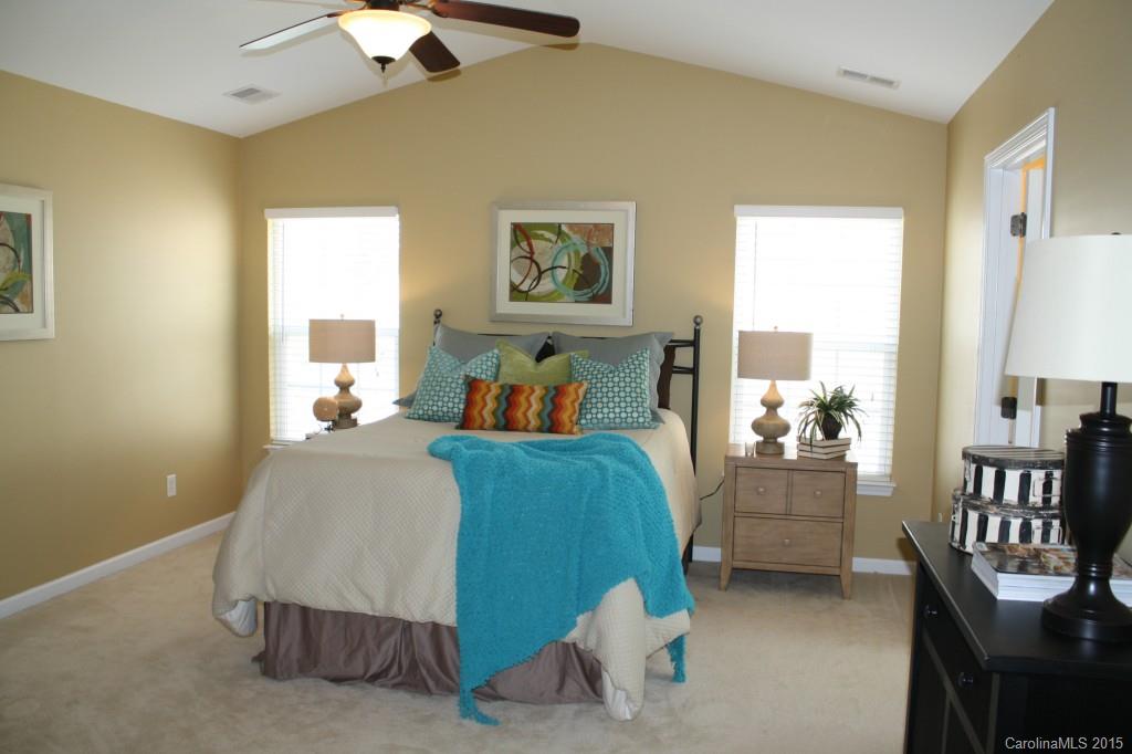 6418 Hermsley Road Charlotte, NC 28278 - Photo 11 of 22 a bedroom with furniture and a window