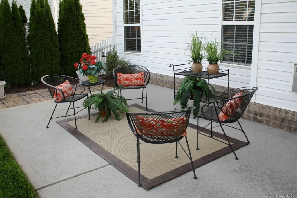 6418 Hermsley Road Charlotte, NC 28278 - Photo 17 of 22 a building outdoor space with patio furniture and potted plants